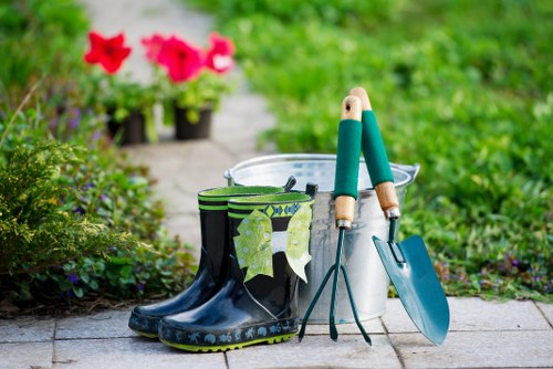 Team member preparing garden tools on site